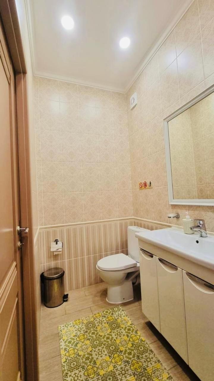 Altyn Aparthotel Astana Bagian luar foto
