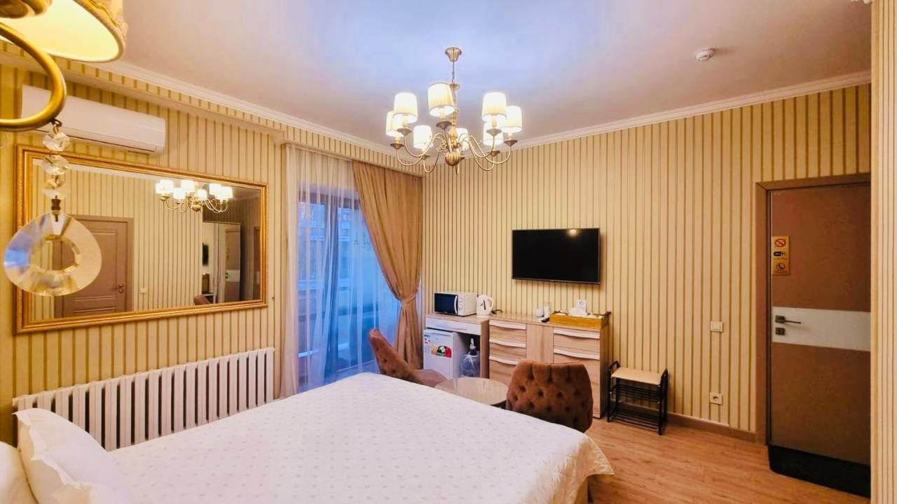 Altyn Aparthotel Astana Bagian luar foto