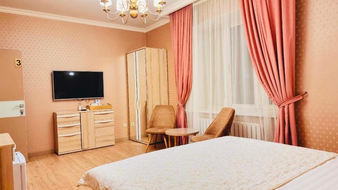 Altyn Aparthotel Astana Bagian luar foto