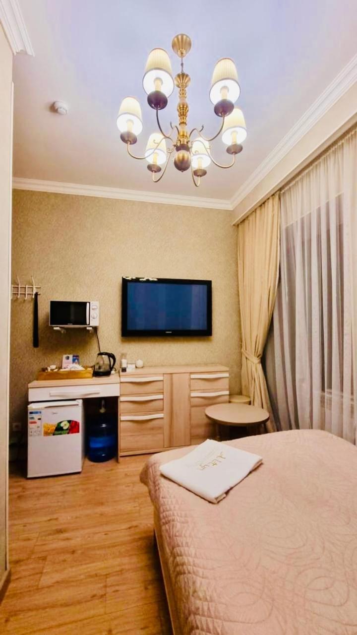 Altyn Aparthotel Astana Bagian luar foto