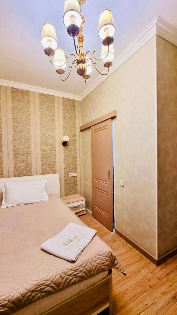 Altyn Aparthotel Astana Bagian luar foto