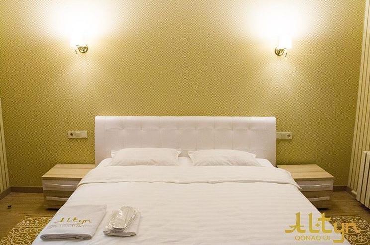 Altyn Aparthotel Astana Bagian luar foto