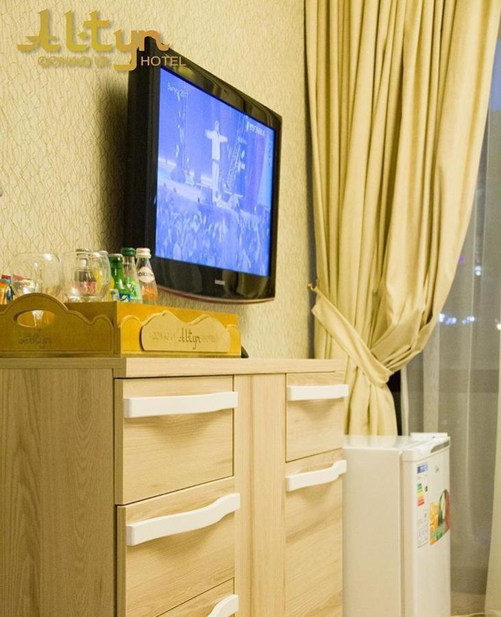 Altyn Aparthotel Astana Bagian luar foto