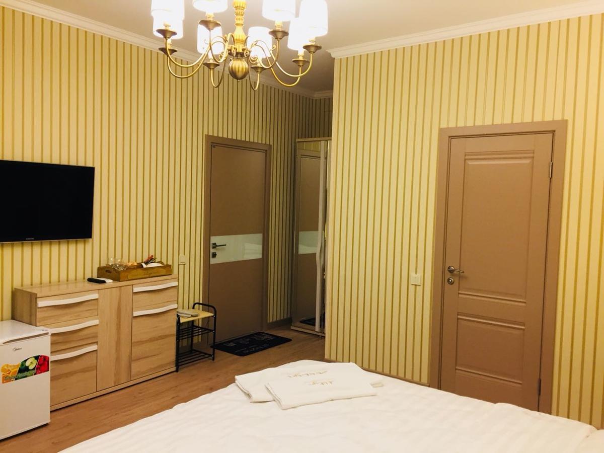 Altyn Aparthotel Astana Bagian luar foto