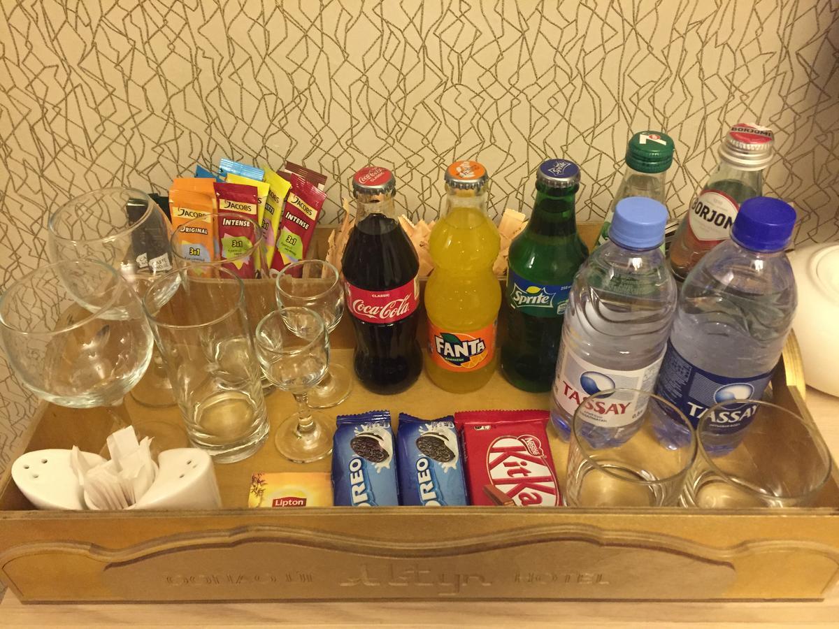 Altyn Aparthotel Astana Bagian luar foto