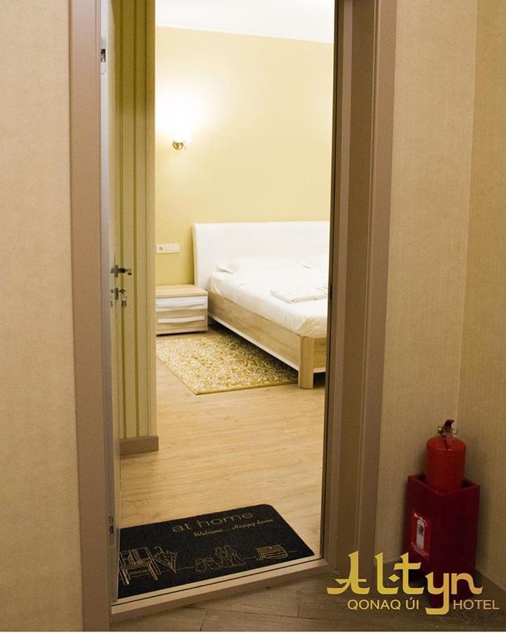 Altyn Aparthotel Astana Bagian luar foto