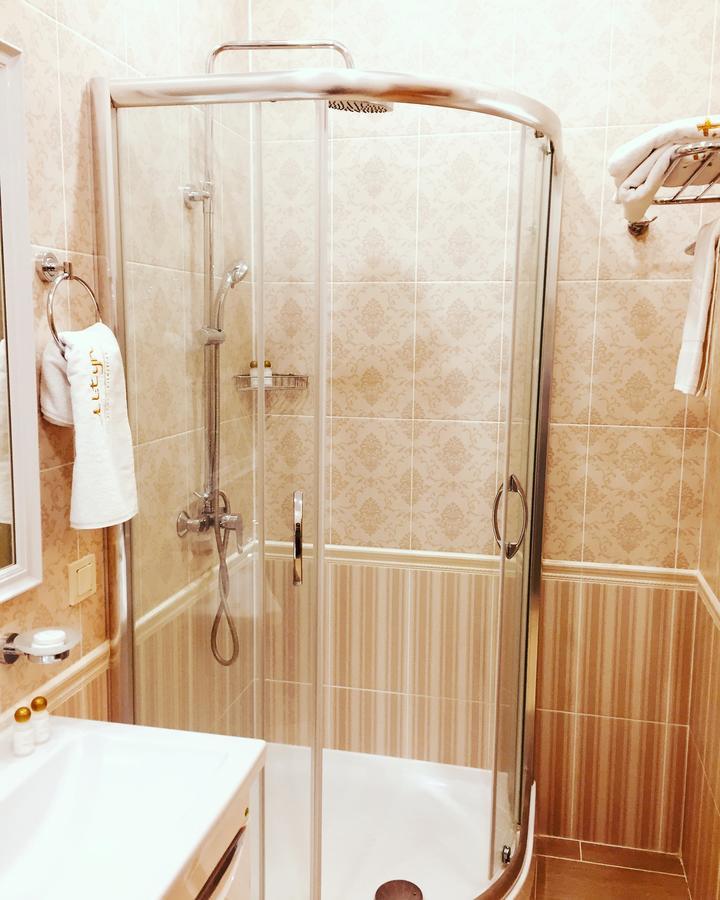 Altyn Aparthotel Astana Bagian luar foto