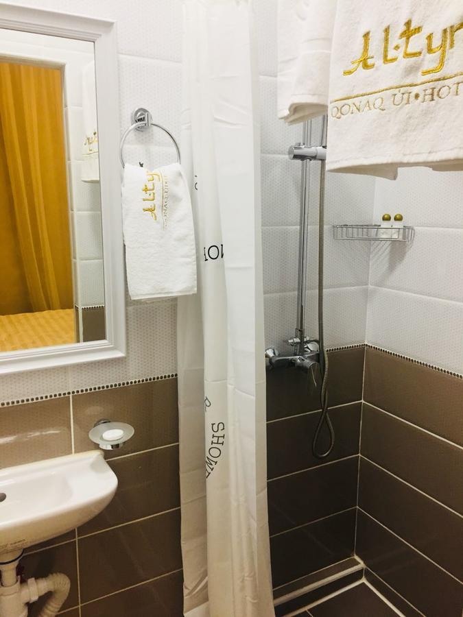 Altyn Aparthotel Astana Bagian luar foto