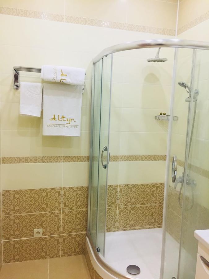 Altyn Aparthotel Astana Bagian luar foto