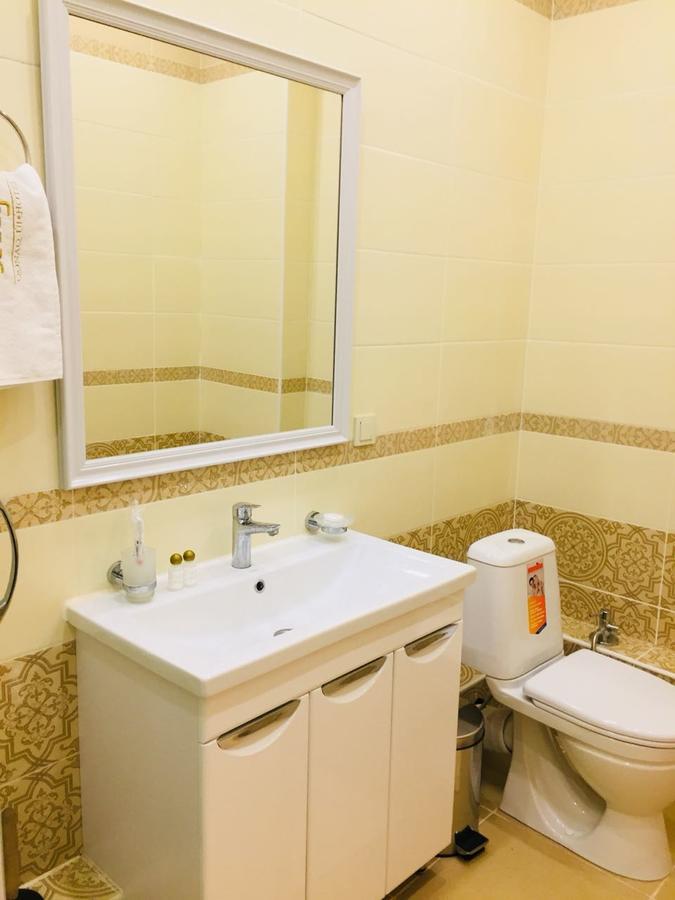 Altyn Aparthotel Astana Bagian luar foto